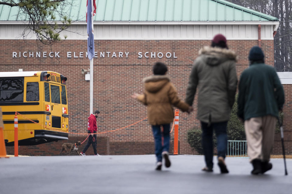 FILE - Students return to Richneck Elementary in Newport News, Va., Jan. 30, 2023. A criminal investigation into staff members at the Virginia school where a 6-year-old shot his teacher will continue, prosecutors said Thursday, April 11, 2024, one day after a former assistant principal was charged with felony child neglect. (Billy Schuerman/The Virginian-Pilot via AP, File)