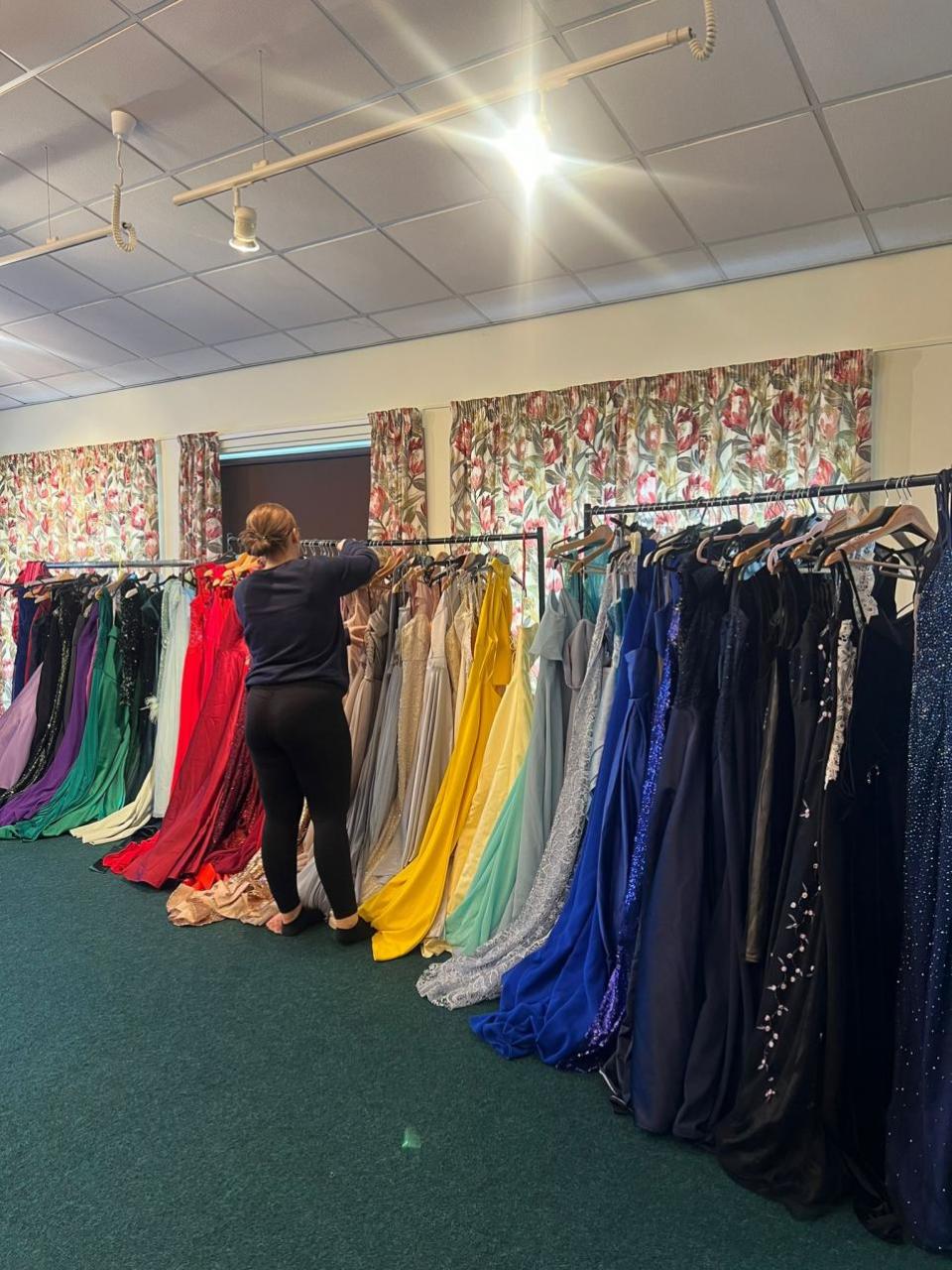 York Press: A selection of prom dresses from over 200 donated so far, prepped and ready for a try-on event