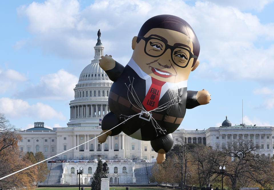 the large balloon floating in front of congress