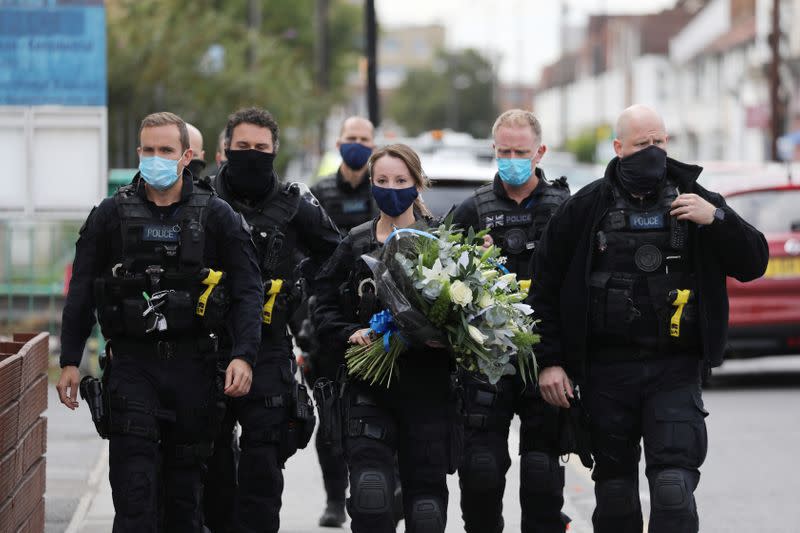 British police officer shot dead at custody centre in south London