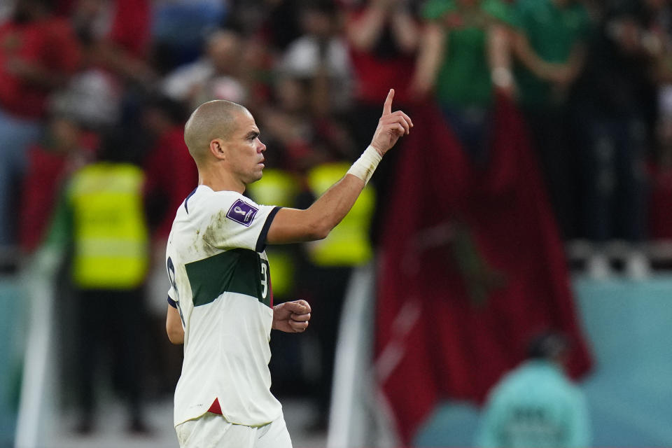 Portugal's Pepe gestures end of the World Cup quarterfinal soccer match between Morocco and Portugal, at Al Thumama Stadium in Doha, Qatar, Saturday, Dec. 10, 2022. (AP Photo/Petr David Josek)