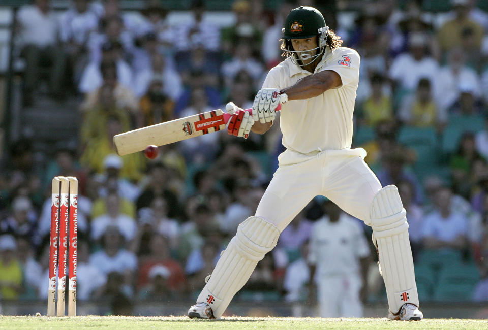 FILE - Australia's Andrew Symonds cuts the ball during their second cricket test against India at the Sydney Cricket Ground in Sydney on Jan. 2, 2008. Symonds has died, Saturday, May 14, 2022, after a single-vehicle auto accident near Townsville in northeast Australia. He was 46. (AP Photo/Rick Rycroft, File)