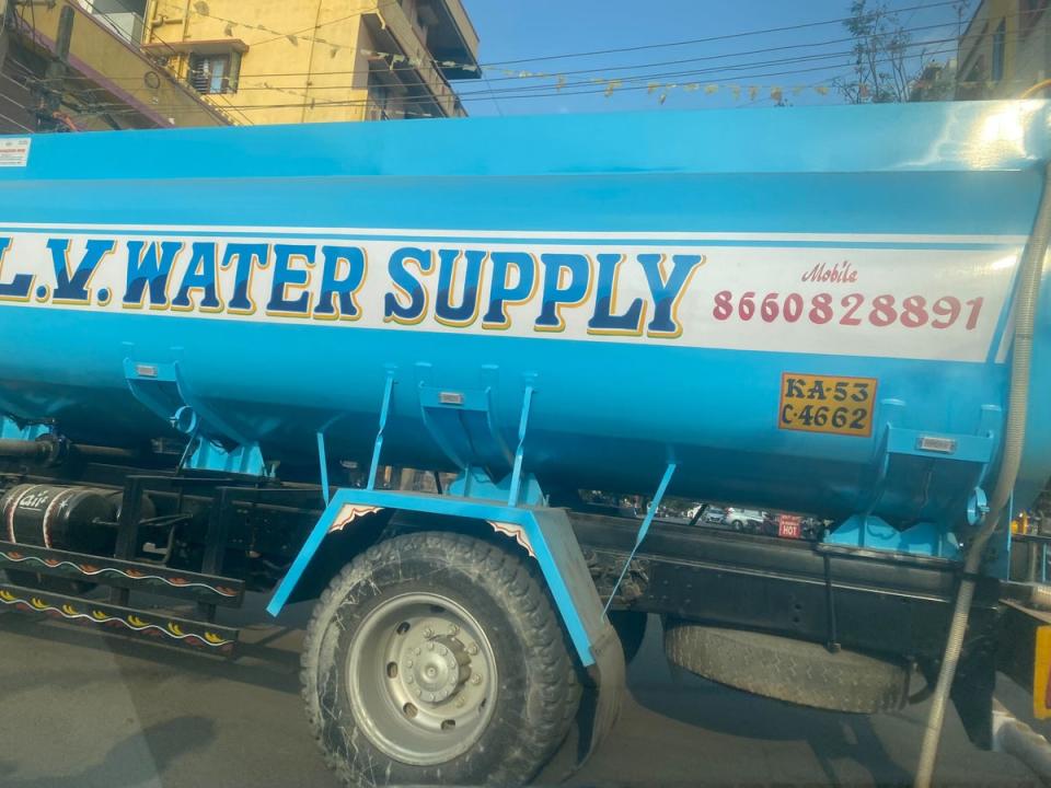 A private water tanker near Whitefield. Residents say they are now paying as much as 3,000 rupees (£300) for a tanker, five to six times the usual rate (The Independent/Stuti Mishra)