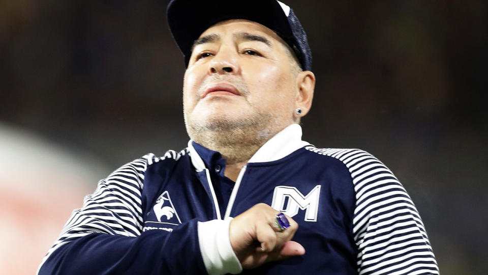 Diego Maradona, pictured here at an Argentina First Division football match in March.