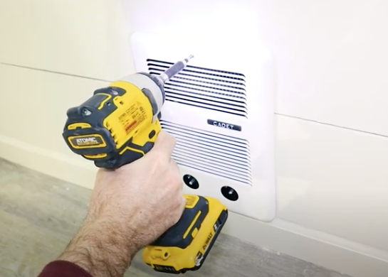 Installing a bathroom heater into the wall
