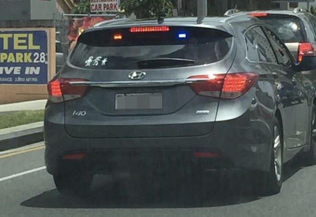 The unmarked police car was photographed driving on a Gold Coast road. Photo: Facebook