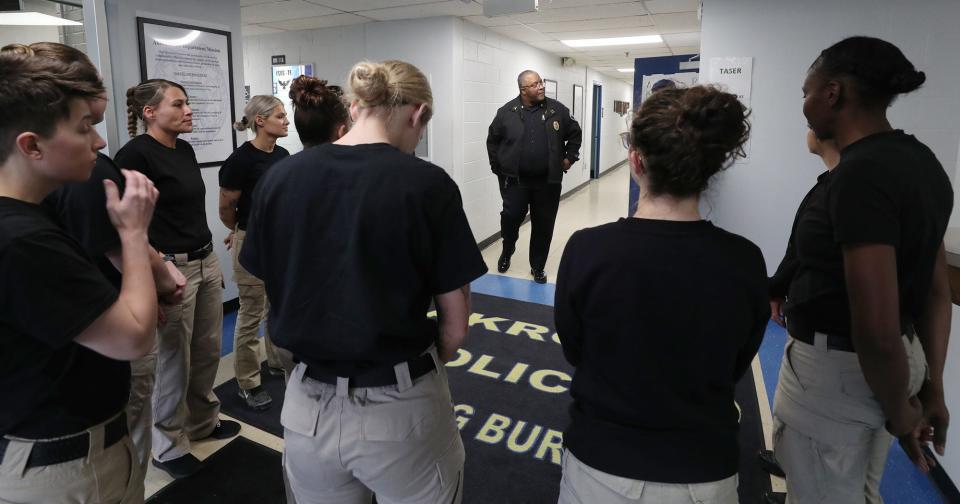 Akron Police Captain Michael Miller talks with 20 female cadets in March at the Akron Police Training Academy. Miller said Akron police have long had de-escalation training, but the names and methods have evolved over the years.