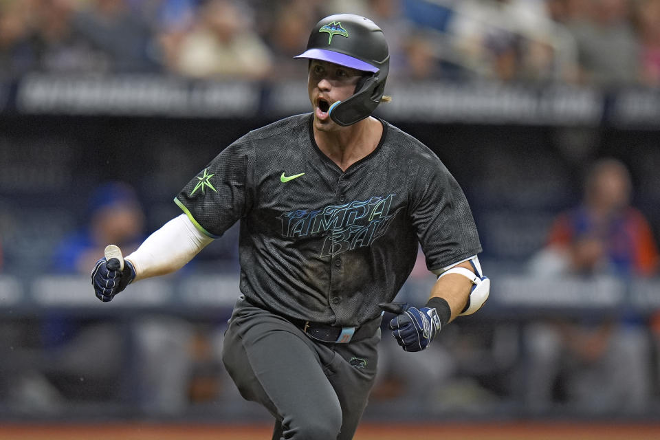 Tampa Bay Rays' Jonny DeLuca celebrates his game-winning hit off New York Mets relief pitcher Jake Diekman during the 10th inning of a baseball game Sunday, May 5, 2024, in St. Petersburg, Fla. (AP Photo/Chris O'Meara)