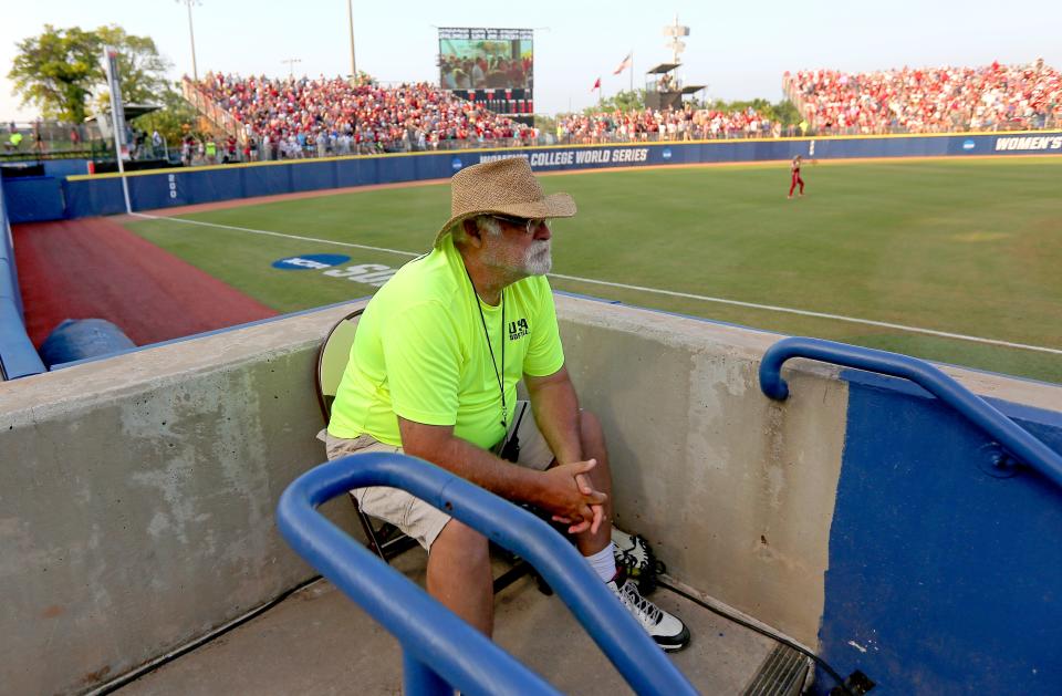 Usher Ed Koch watches during the second game of the Women's College World Series championship series between the University of Oklahoma Sooners (OU) and Florida State University at the USA Softball Hall of Fame Stadium in Oklahoma City, Wednesday, June 9, 2021.