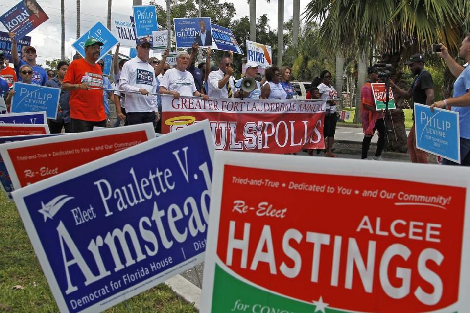 Democratic candidates for governor, judgeships, local offices, and for Congress, along with supporters, march over one mile towards Reverend Samuel Delevoe Memorial Park during the “Souls to the Polls” event to encourage voter participation and early voting on Sunday, August 26, 2018 in Fort Lauderdale, Florida.