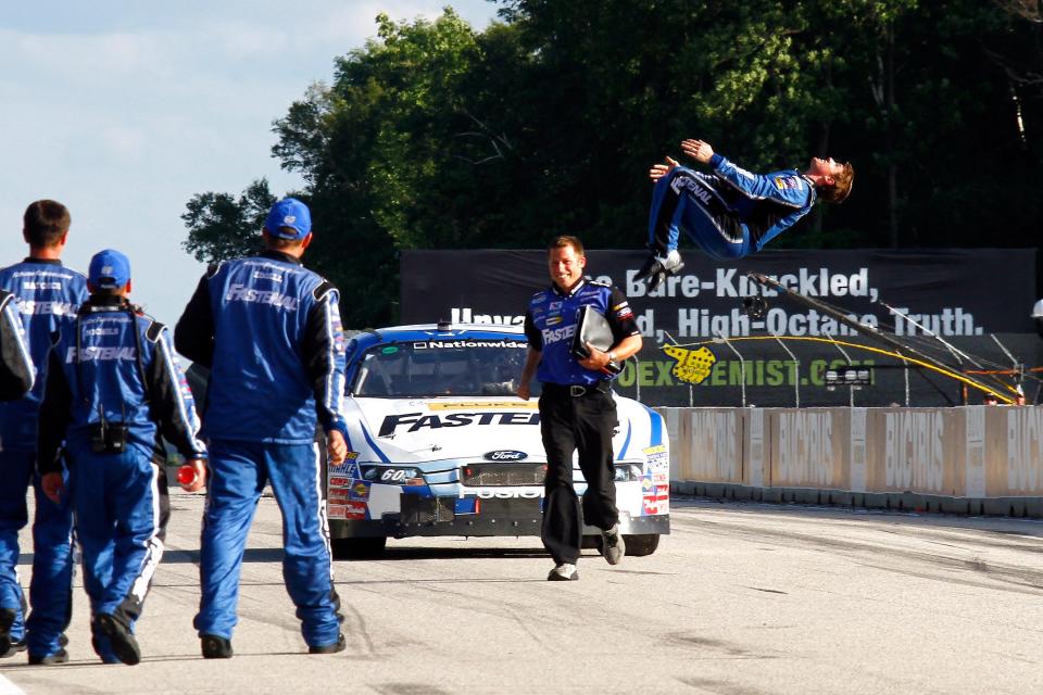 Carl Edwards performs a back-flip after winning the 2010 Nationwide Series Bucyrus 200 in NASCAR's return to Road America after more than 50 years.