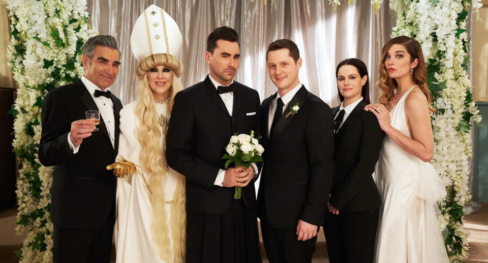 Alexis and Moira technically broke the cardinal wedding rule at David and Patrick's wedding on Schitt's Creek. Credit: POP TV 