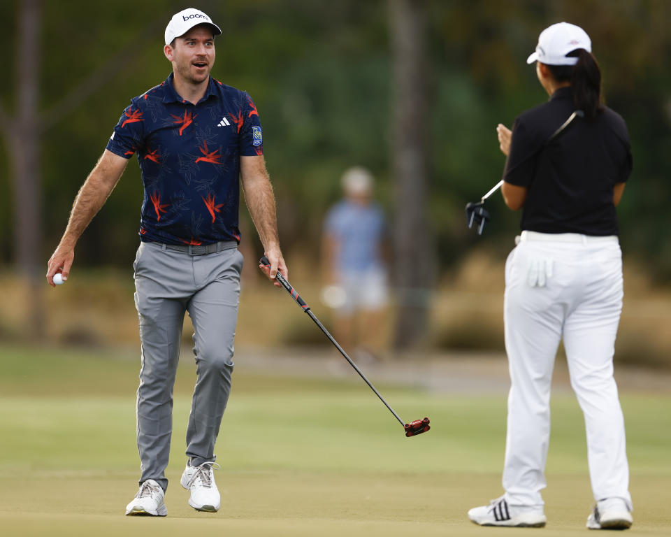 NAPLES, FLORIDA – DECEMBER 09: Nick Taylor of Canada and Ruoning Yin of <a class="link " href="https://sports.yahoo.com/soccer/teams/china-women/" data-i13n="sec:content-canvas;subsec:anchor_text;elm:context_link" data-ylk="slk:China;sec:content-canvas;subsec:anchor_text;elm:context_link;itc:0">China</a> during the second round of the Grant Thornton Invitational at Tiburon Golf Club on December 09, 2023 in Naples, Florida. (Photo by Douglas P. DeFelice/Getty Images)