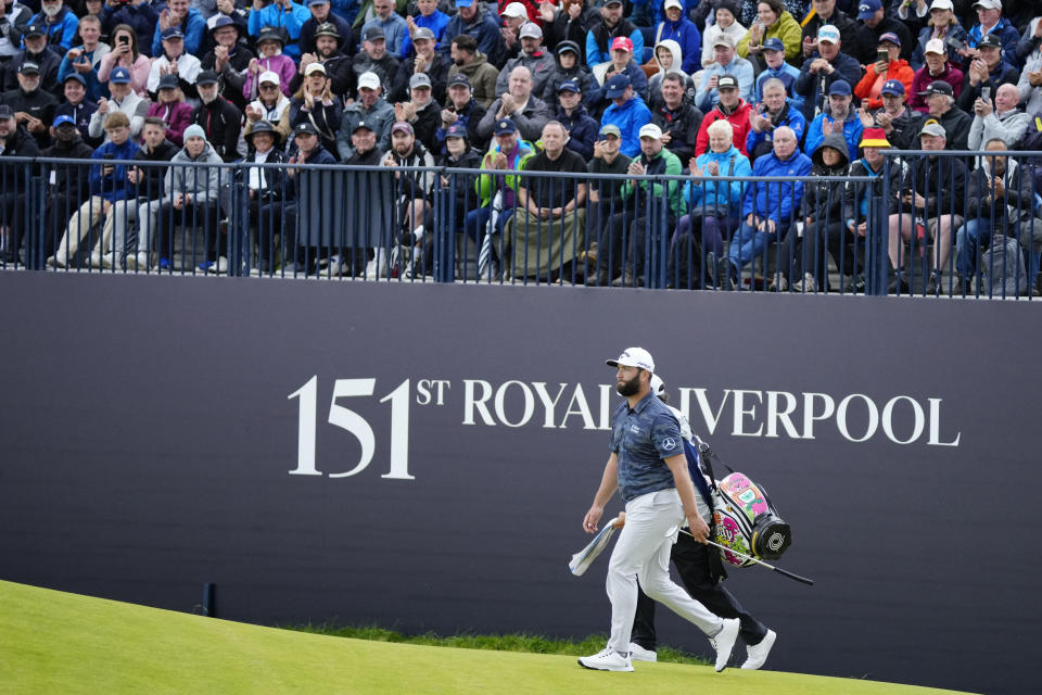 Spain's Jon Rahm walks onto the 17th green during the third day of the British Open Golf Championships at the Royal Liverpool Golf Club in Hoylake, England, Saturday, July 22, 2023. (AP Photo/Jon Super)