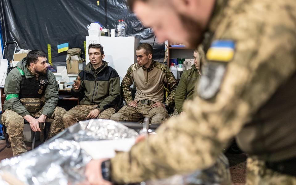  Ukrainian army medics from the 93rd Mechanized Brigade (Kholodnyi Yar) treat wounded soldiers at a stabilisation point near Bakhmut frontline, Donetsk Oblast - Anadolu Agency/Anadolu