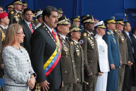 Venezuela's President Nicolas Maduro and his wife Cilia Flores attend a military event in Caracas, Venezuela, August 4, 2018. Miraflores Palace/Handout via REUTERS