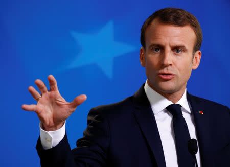 French President Emmanuel Macron holds a news conference following the European Union leaders summit in Brussels, Belgium June 29, 2018. REUTERS/Francois Lenoir