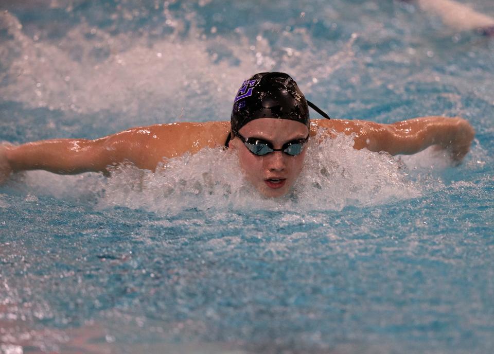 South Eugene's Claire Sheerin competes in the girls 100 yard butterfly on the way to the win during the 6A Southwest Conference district meet at Willamalane Pool in Springfield Saturday, Feb. 11, 2023.