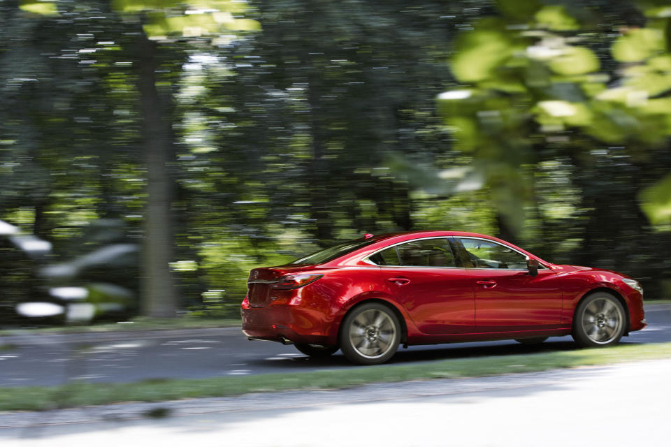 This photo provided by Mazda shows the 2021 Mazda 6, a midsize sedan with a sporty driving style and excellent interior for its price. (Mazda North American Operations via AP)