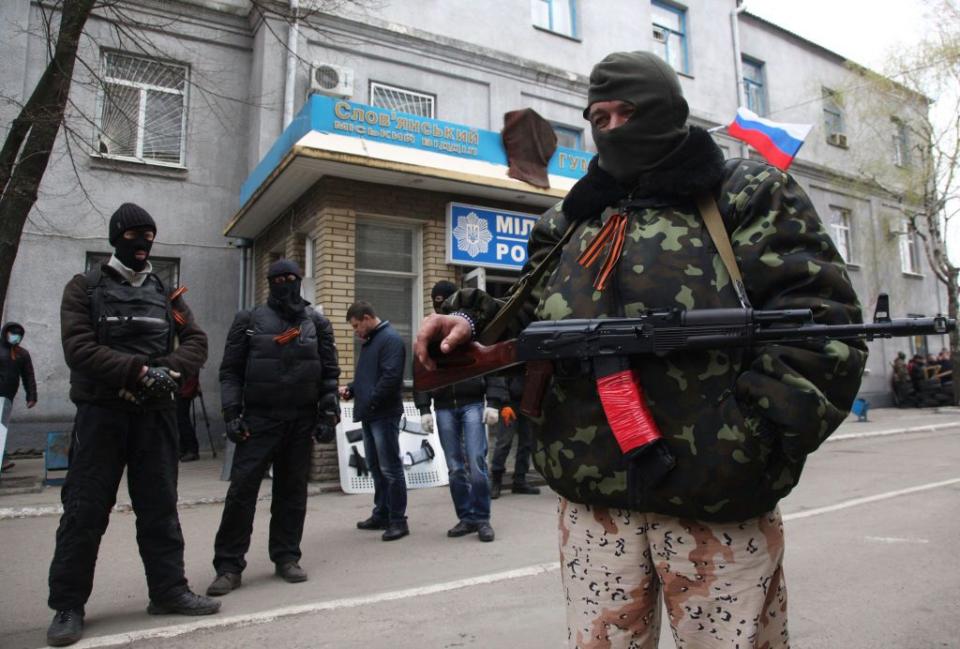 Russian-backed militants guard a police station in the eastern Ukrainian city of Sloviansk after it was seized by a few dozen gunmen on April 12, 2014. (Anatoly Stepanov/AFP via Getty Images)