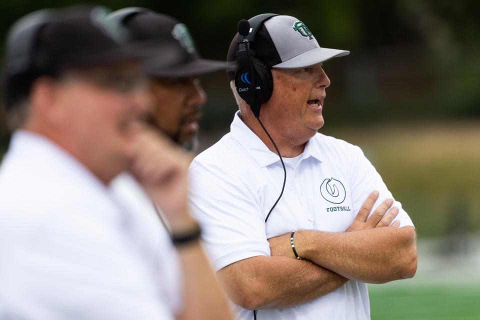 Olympus’s coach Brandon Burt yells from the sidelines in the high school football game against Provo at Olympus High School in Holladay on Friday, Aug. 18, 2023. | Megan Nielsen, Deseret News