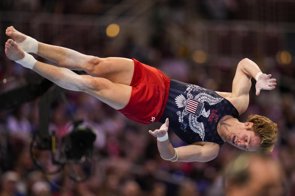 FILE - Gage Dyer competes in the floor exercise during the men's U.S. Olympic Gymnastics Trials Saturday, June 26, 2021, in St. Louis. Dyer retired in early 2022 after a battle with "the twisties," a gymnastics term that refers to when an athlete loses their ability to control their bodies while twisting during a routine. (AP Photo/Jeff Roberson, File)