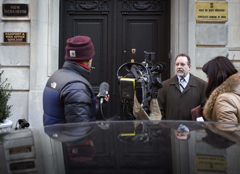 Daniel Arshack, lawyer of Devyani Khobragade, speaks to Reuters TV in front of the Indian Consulate building in New York December 18, 2013. Khobragade, a deputy consul general at the Indian Consulate in New York, was arrested on December 12 on charges of visa fraud and underpaying her housekeeper, and later released on a $250,000 bail. Her arrest triggered a diplomatic row between the two countries. Indian media said on Wednesday Khobragade has been transferred to the Indian Mission to the United Nations for full diplomatic immunity. REUTERS/Carlo Allegri (UNITED STATES - Tags: POLITICS MEDIA)