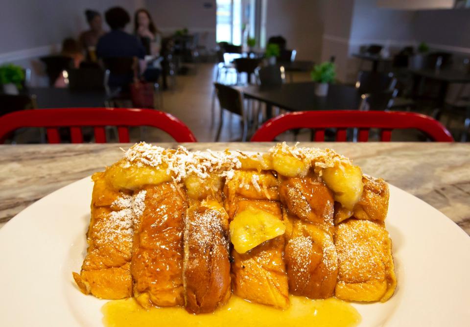 On the menu at Big John&#39;s Eatery: Bourbon Banana Coconut French Toast. The daylight diner is located off Sansburys Way at Southern Boulevard in suburban West Palm Beach.