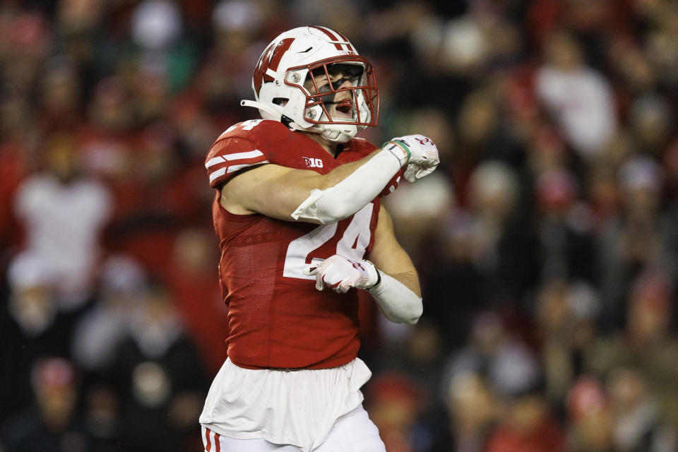 Nov 11, 2023; Madison, Wisconsin, USA; Wisconsin Badgers safety Hunter Wohler (24) celebrates following a play during the third quarter against the Northwestern Wildcats at Camp Randall Stadium. Mandatory Credit: Jeff Hanisch-USA TODAY Sports