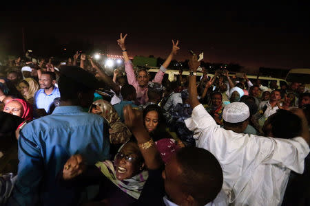 Supporters shout outside the National Prison during the release of politicians and journalists, after demonstrations in Khartoum, Sudan February 18, 2018. REUTERS/Mohamed Nureldin Abdallah