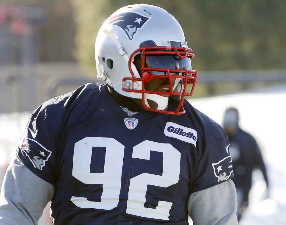New England Patriots linebacker James Harrison runs through a drill during practice Wednesday. (AP)