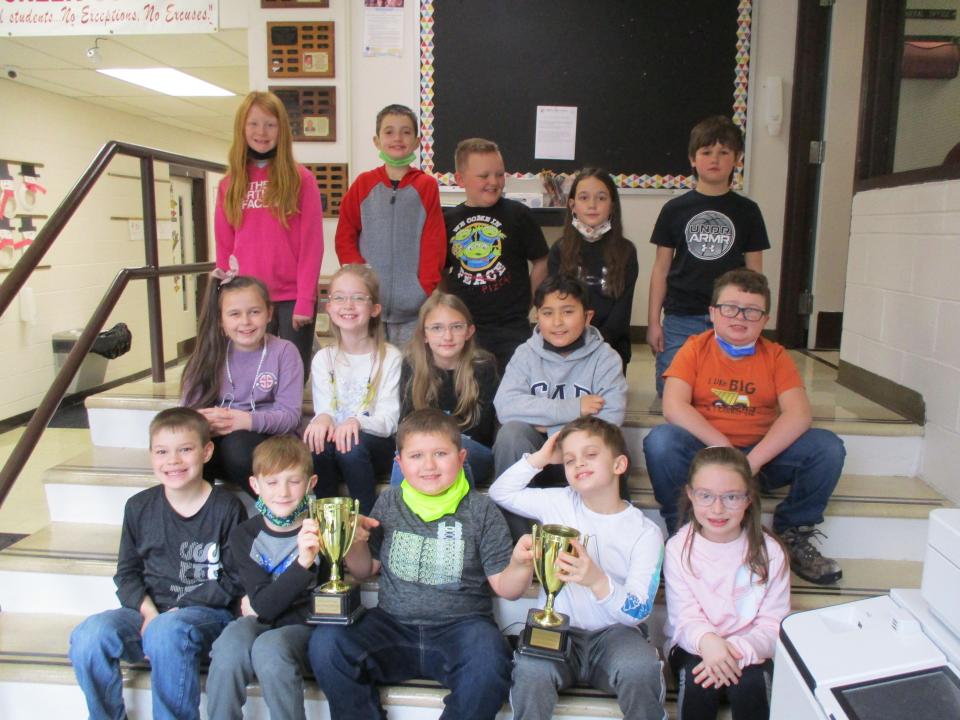 Jessica Davy’s third grade class at New Creek Primary School earned two of the attendance awards for their class having the fewest unexcused absences and the fewest absences during the second nine weeks. The class received the trophy to display until the end of the next marking period.  Pictured are: (front) Connor Roderick, Charlie Maszor, Hayden Costello, Spencer Metcalf, and Bethanie Corbin; (back) Kynslea Lambka, Jude Barrick, Kayson Snyder, Maci Knaggs, and Lucas Kisamore Middle Row: Roslyn Leatherman, Ella Conrad, Gabby Hundley, Logan Milla, and Uriah Helman. Absent when the picture was taken: Logan Huffman, Addy Everett, Paisley Leatherman, and Gracie Clark.