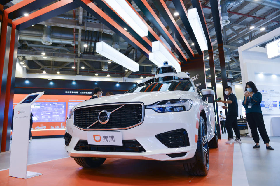 SUZHOU, CHINA - AUGUST 14, 2020 - Visitors look at a 5G driverless car at the expo. Suzhou city, Jiangsu Province, China, 14 August 2020.- PHOTOGRAPH BY Costfoto / Barcroft Studios / Future Publishing (Photo credit should read Costfoto/Barcroft Media via Getty Images)