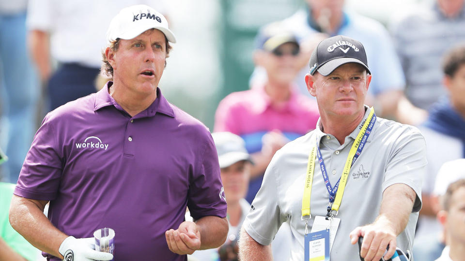 Seen here, Phil Mickelson and his Aussie coach Andrew Getson stand together on the course.