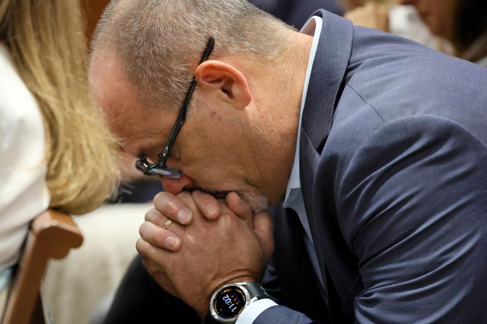 Fred Guttenberg reacts as he awaits a verdict in the trial of Marjory Stoneman Douglas High School shooter Nikolas Cruz at the Broward County Courthouse in Fort Lauderdale, Florida, on October 13, 2022. Guttenbergs daughter, Jaime, was killed in the 2018 shootings. - A US jury on Thursday rejected the death penalty for Cruz, who shot and killed 17 people at his former Florida high school, opting instead for life imprisonment without the chance of parole. As the verdict was read, Cruz, wearing a striped sweater and large glasses, stared down expressionless at the defense table while several relatives of the victims in the public gallery shook their heads in disbelief.