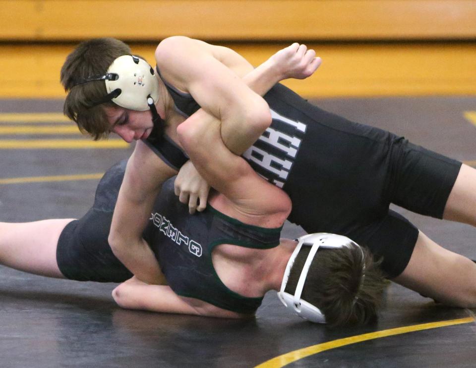 Austin McBurney (top) of Perry defeated Hunter Kurylo of GlenOak in a 113 pound bout at Perry on Thursday, Jan. 7, 2021. 