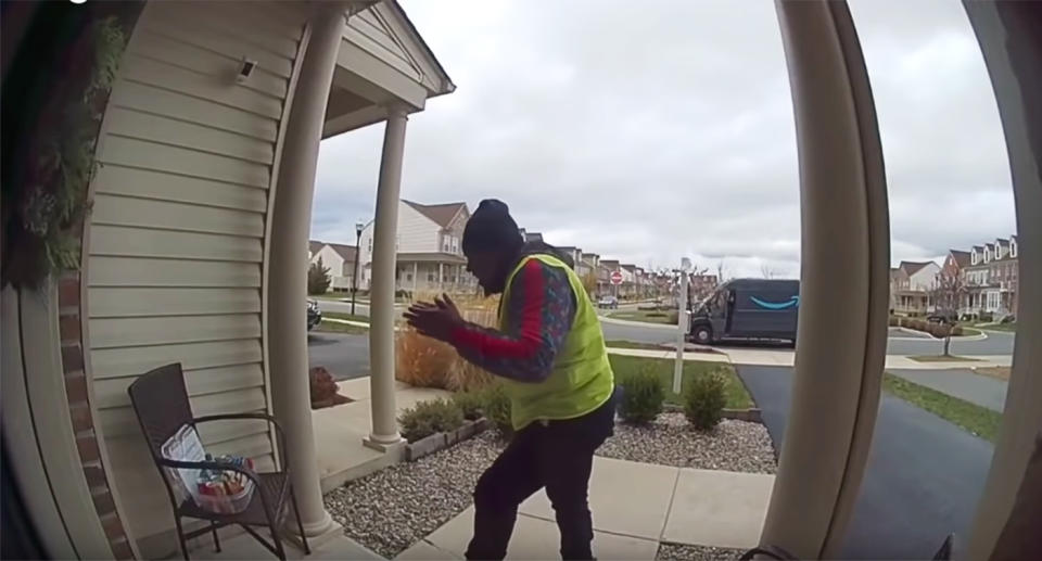 delivery driver dances after getting some treats from a customer