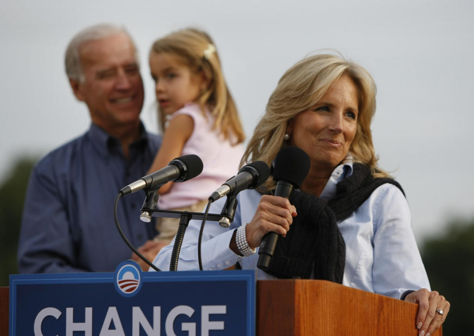 FILE - Jill Biden introduces her husband, Democratic vice presidential candidate Sen. Joseph Biden, D-Del., to speak at a campaign rally in Media, Pa., Tuesday, Sept. 16, 2008. Biden is holding his granddaughter Natalie Biden, 4. “Jill: A Biography of the First Lady,” by Associated Press journalists Julie Pace and Darlene Superville, details the life of Jill Biden. Superville covers the White House for the AP; Pace, a former White House correspondent and Washington bureau chief, is now AP’s executive editor. (AP Photo/Gerald Herbert, File)