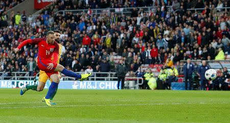 Britain Football Soccer - England v Australia - International Friendly - Stadium of Light, Sunderland - 27/5/16 Wayne Rooney scores the second goal for England Reuters / Andrew Yates