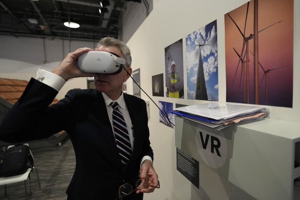 Geoff Pyatt, ambassador Geoffrey Pyatt, Assistant Secretary of State for Energy Resources, uses VR at the Ukraine Pavilion at the COP28 U.N. Climate Summit, Monday, Dec. 4, 2023, in Dubai, United Arab Emirates. (AP Photo/Rafiq Maqbool)