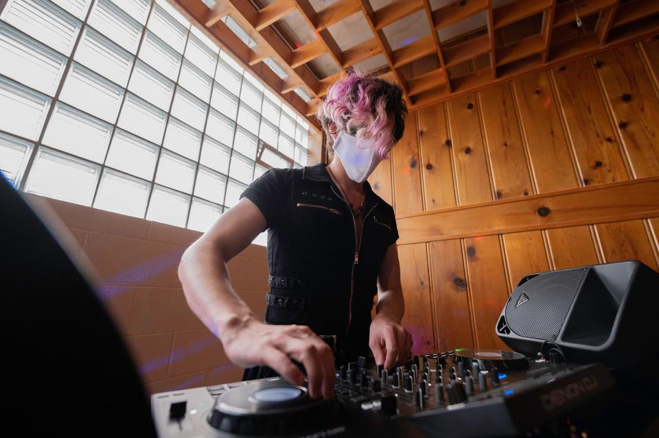 Jordan Clark works the turntables as DJ JOJOSTAR during the Pride Prom at The Ethos on Friday, August 11, 2023.