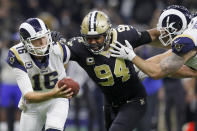 <p>Jared Goff #16 of the Los Angeles Rams gets sacked by Cameron Jordan #94 of the New Orleans Saints during the fourth quarter in the NFC Championship game at the Mercedes-Benz Superdome on January 20, 2019 in New Orleans, Louisiana. (Photo by Jonathan Bachman/Getty Images) </p>