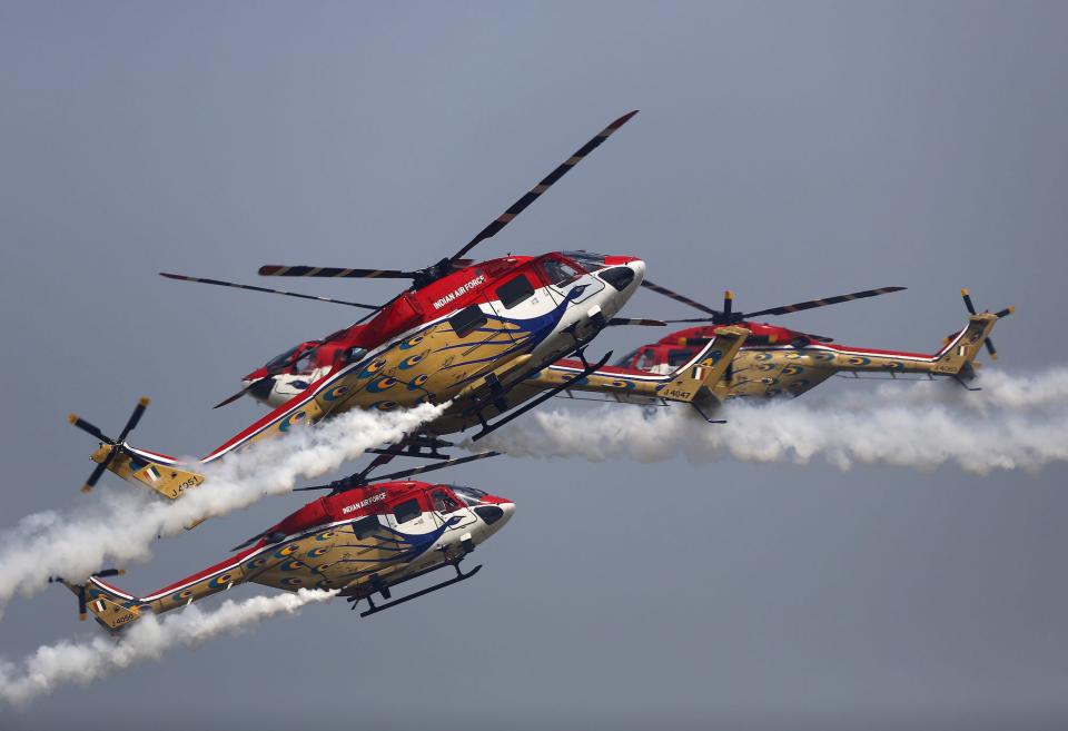 Indian Air Force "Sarang" helicopters perform during the full-dress rehearsal for Indian Air Force Day at the Hindon air force station on the outskirts of New Delhi in October 2015.