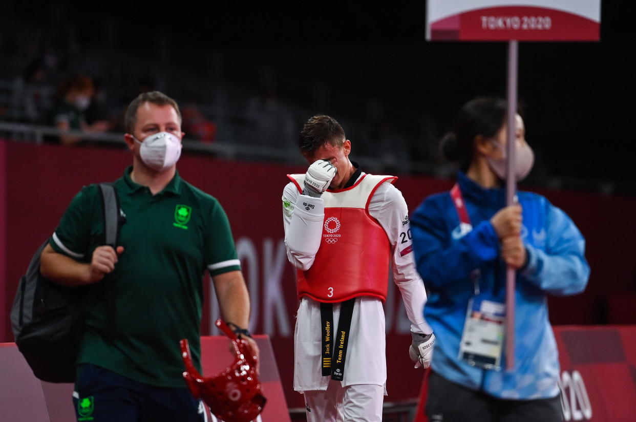 Tokyo , Japan - 24 July 2021; Jack Woolley of Ireland, reacts after defeat to Lucas Lautaro Guzman of Argentina during the men's -58Kg taekwondo round of 16 at the Makuhari Messe Hall during the 2020 Tokyo Summer Olympic Games in Tokyo, Japan. (Photo By Brendan Moran/Sportsfile via Getty Images)