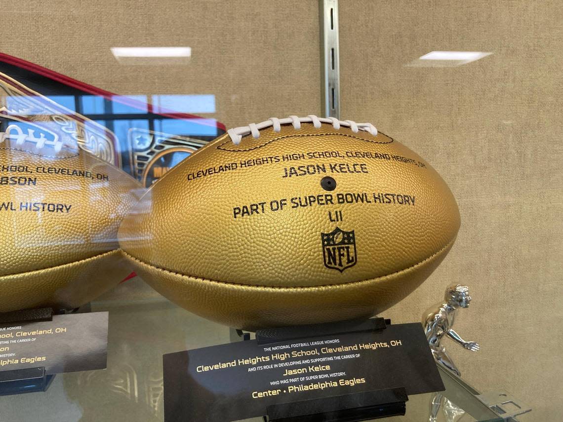 A golden football displayed at Heights High School honors 2006 alum Jason Kelce for his victory in Super Bowl LII in 2018.