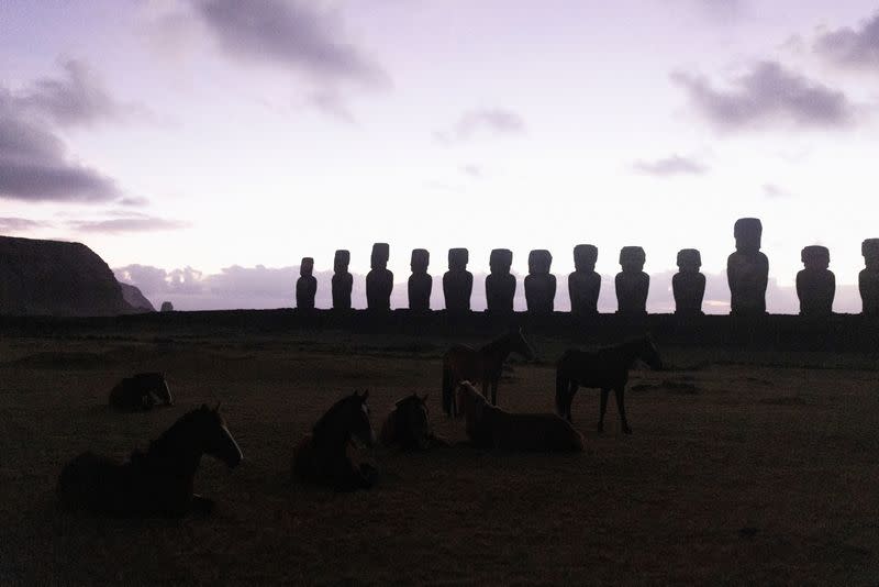 FILE PHOTO: Burned Moai statues on Easter Island lay bare the scars of land grabs