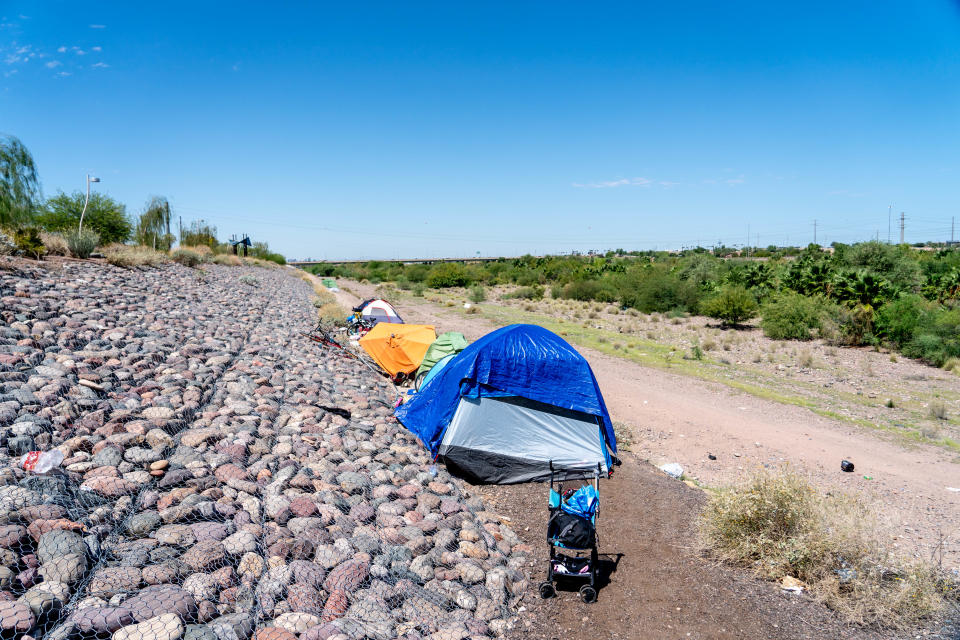 Tents are set up at a homeless encampment along the Rio Salado riverbed in Tempe on Aug. 31, 2022. Tempe gave notice for people living in the river bottom to vacate by Aug. 31.