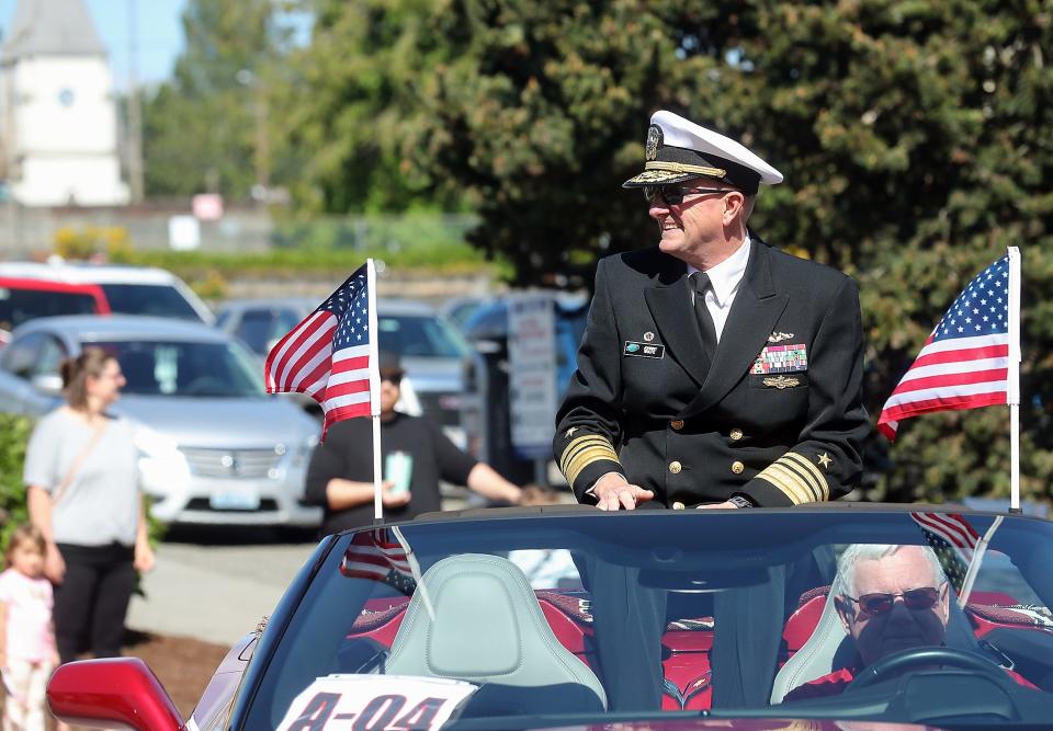 Navy Vice Admiral Johnny Wolfe, Jr. rides in the Armed Forces Day parade on Saturday, May 21, 2022.