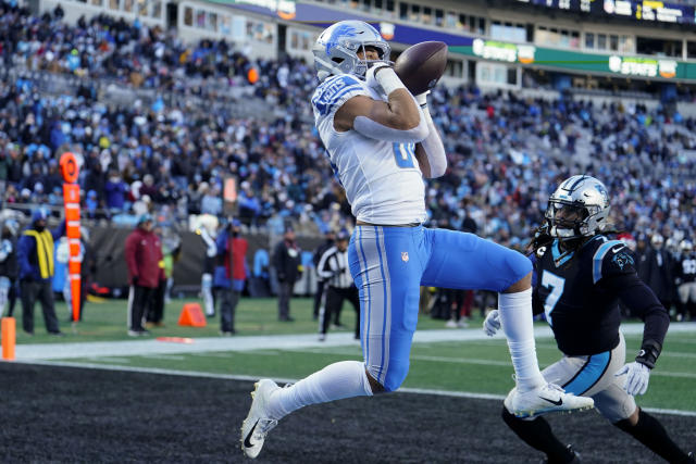 Detroit Lions running back Devine Ozigbo (30) watches from the sideline  during an NFL preseason football game against the Carolina Panthers,  Friday, Aug. 25, 2023, in Charlotte, N.C. (AP Photo/Brian Westerholt Stock