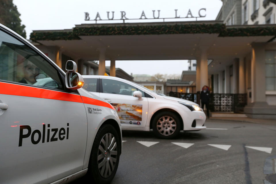 A police car is driving on December 3, 2015 in front of the entrance of the Hotel Baur au Lac in Zurich, where Swiss authorities have conducted an early-morning operation to arrest several FIFA football officials.
The Swiss government said two FIFA officials were detained in Zurich on December 3 ,confirming reports of newarrests in the broadening FIFA scandal, and said they were suspected of accepting millions of dollars in bribes.  / AFP / MICHELE LIMINA        (Photo credit should read MICHELE LIMINA/AFP via Getty Images)